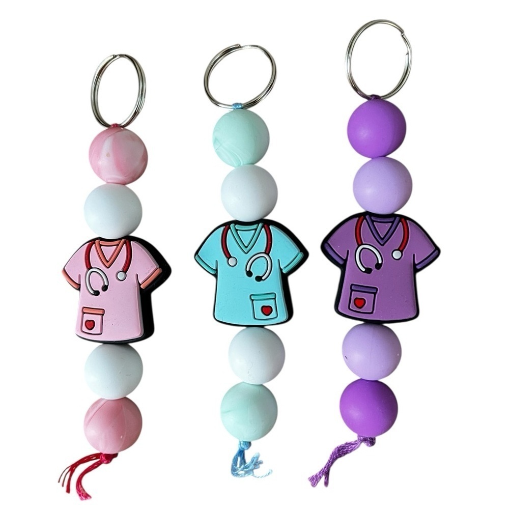 Nurse badge pulls keychains scrubs pink blue purple